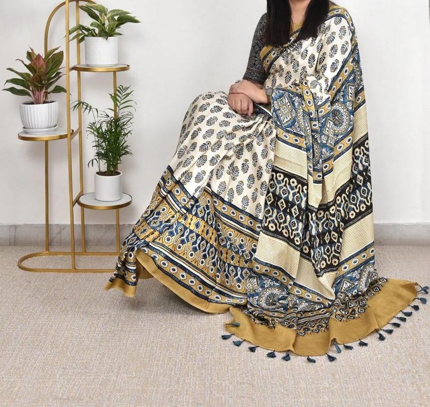 DHARVI CREAM COLOR AJRAK PRINTED MUSLIN COTTON SAREE