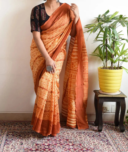 EXCLUSIVE ORANGE PRINTED LINEN SAREE