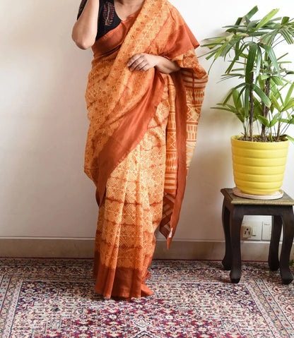 EXCLUSIVE ORANGE PRINTED LINEN SAREE